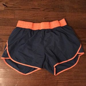 grey and orange athletic shorts